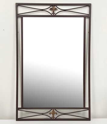 A Wrought Iron Mirror With Fleur De Lys Motif