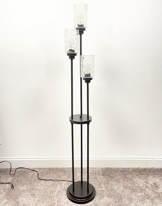 A Contemporary Bronze Standing Lamp - 3 Lite With Glass Shades