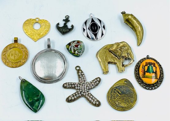 An Assortment Of Pendants, Buckles, And Oddities