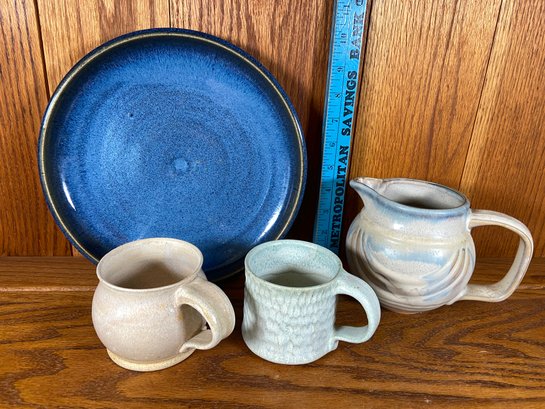 Collection Of Handmade Signed Pottery: Blue Plate, Cream Color Mugs And Juice Pitcher