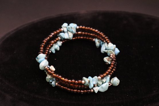 Turquoise And Amber Colored Bead Coil Bracelet