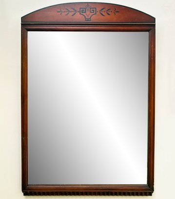 A Vintage Mahogany Mirror With Scrolled Details