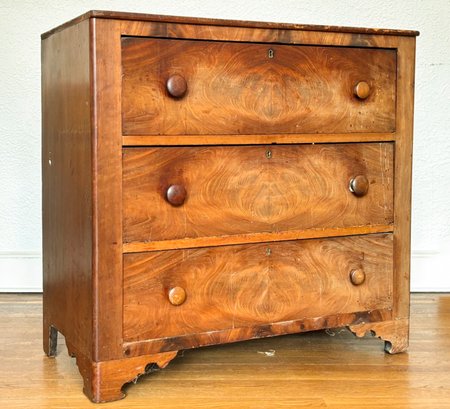 A 19th Century Chest Of Drawers In Crotch Mahogany Veneer
