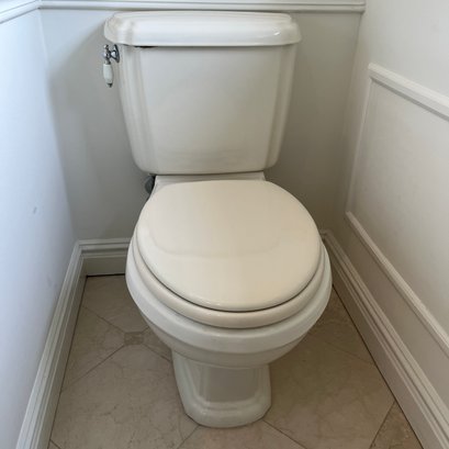 An American Standard 2 Piece Toilet - Primary Bath