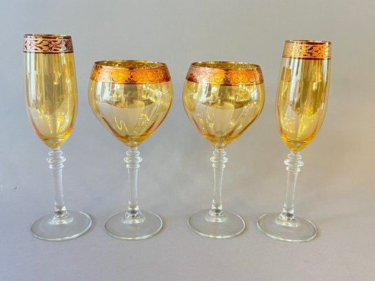 Pair Of Gold Rim Wine Glasses And Champagne Flutes