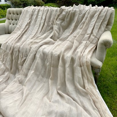 A Set Of Gauzy Linen Triple Pinch Pleat Drapes With Cotton Lining