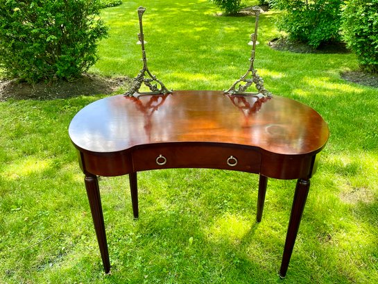 Kidney Shaped Table With Center Drawer And Attached Brass Candlestick Holders