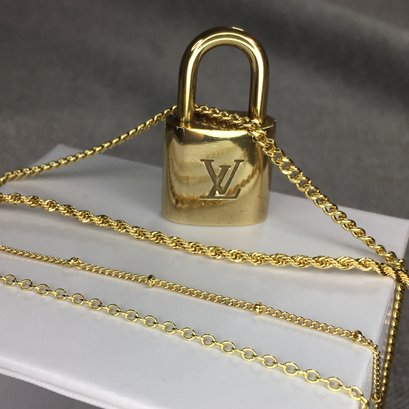 Fabulous Genuine LOUIS VUITTON Lock Mounted As Necklace Pendant - Comes With Four Different Chains - WOW !
