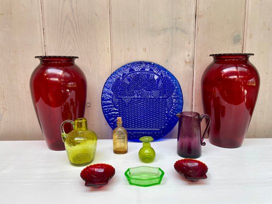 Variety Of Colored Glassware Vessels & Vases