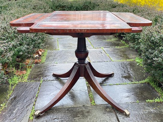 A Vintage Leather Top Game Table