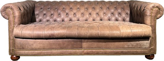 A Leather Chesterfield Sleeper Sofa By The Janess Furniture Company