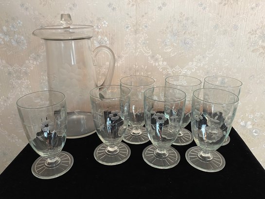 Glass Pitcher And Drinking Glasses