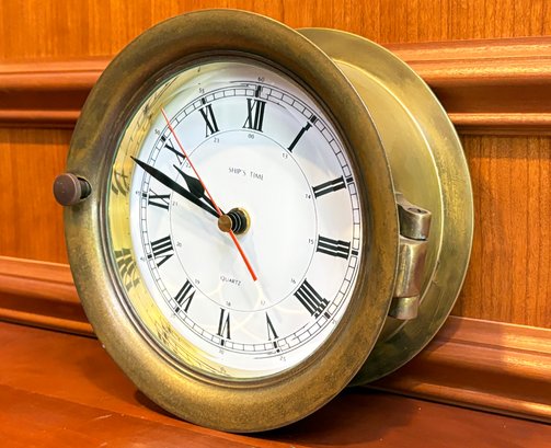 A Vintage Brass Quartz Nautical Clock