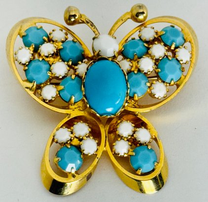 VINTAGE GOLD TONE BLUE AND WHITE OPAQUE GLASS STONE BUTTERFLY BROOCH