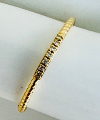 14K GOLD BAND SET WITH 7 SMALL DIAMONDS RING