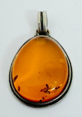 VINTAGE STERLING SILVER AND AMBER PENDANT
