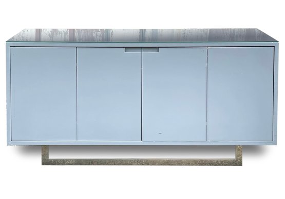 A Modern Grey Lacquer And Glass Top Credenza