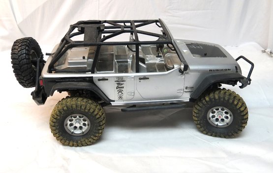 Axial Motorized Silver SCX10 Jeep Wrangler Rock Crawler With Open Removable Top