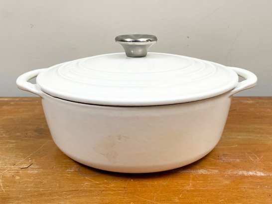 An Enameled Cast Iron Dutch Oven By Le Creuset