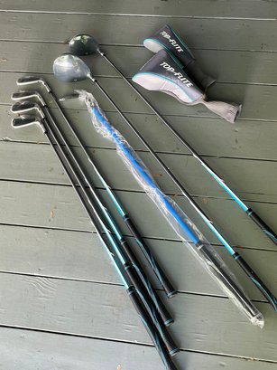 7 New Unopened Golf Clubs And Two Covers