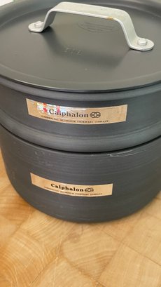 A  CALPHALON 2 1/2 Quart Pot With Strainer Basket And Lid