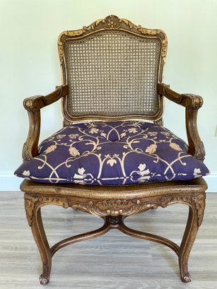 Antique French Provincial Side Arm Chair With Cane Back And Seat.