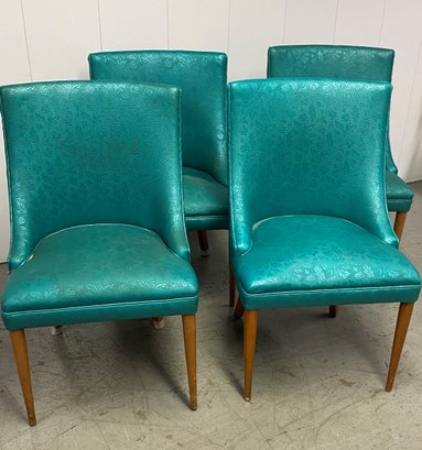 A Fantastic Set Of Four MCM Vinyl Dining Chairs.