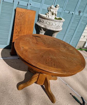 Oak Pedestal Round Dining Table With One Leaf