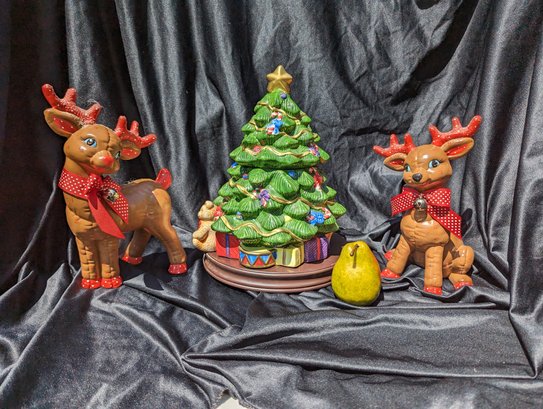 Ceramic Christmas Decorations That Includes A Cookie Jar Tree On A Wood Base.