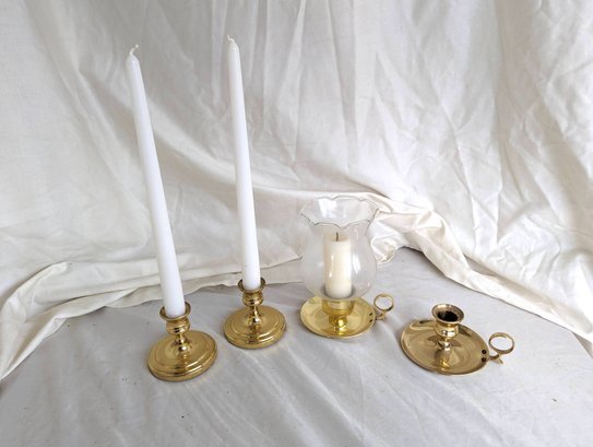 Collection Of Four Candle Sticks With Three Being Marked Baldwin