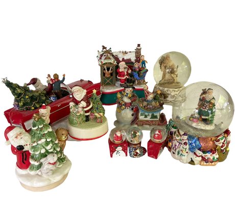A Collection Of  Vintage Christmas Music Boxes And Snow Globes (D)