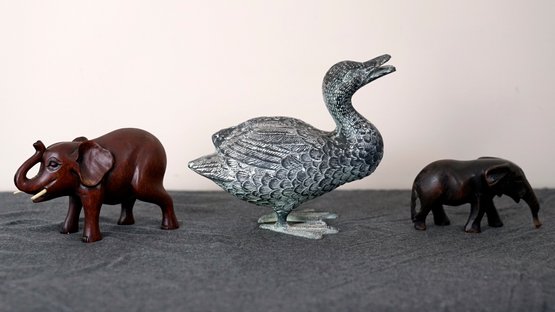 Bronze Duck And Carved Wooden Elephants