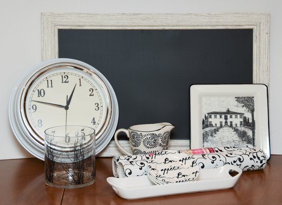 Black-and-white Themed Kitchen Decor Including Chalkboard Menu, Clock And Drawer Liners And More