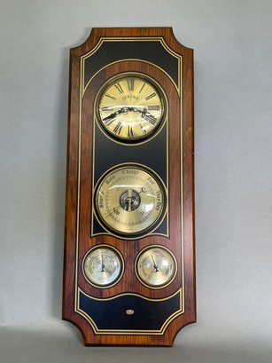 A Hamilton Standard Bulova Weather Station Barometer Clock
