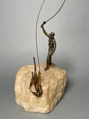 Brass Fisherman On Stone