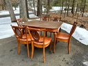 A Beautiful Table & Chairs With Two Leaves