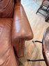 Pair Of Tan Leather Chairs With Ottoman