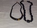 Two Black And Gold Necklaces