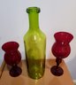 Two Vintage Red Glass Candle Holders With Large Olive Green Glass Bottle