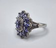 Beautiful Tanzanite & White Zircon Floral Ring In Platinum Over Sterling