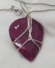Enormous 84.50 Carat Red Ruby With Heavy Inclusions And An 18' Silver Plated Necklace
