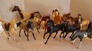 A Collection Of Plastic Horses