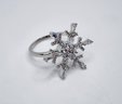 Simulated Diamond Snowflake Spinner Ring In Silvertone