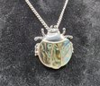 Abalone Shell Ladybug Pendant Necklace In Silvertone