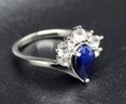 Blue Sapphire, White Topaz, Rhodium Over Sterling Ring