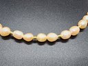 Peach Freshwater Pearl Necklace In Gold Tone