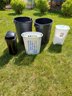LOT OF PLASTIC GARBAGE PAILS AND CLOTHES BASKET