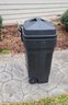 Rubbermaid Garbage Pail On Wheels.  With Lid. 4 Available. - - - - - - - - - - - - - - Loc: Garage Side