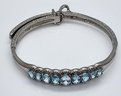Sky Blue Topaz Bangle Bracelet With Adjustable Lock In Stainless