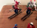 Large Group Of Barclays Lead Figures Including Skiers And Sleds